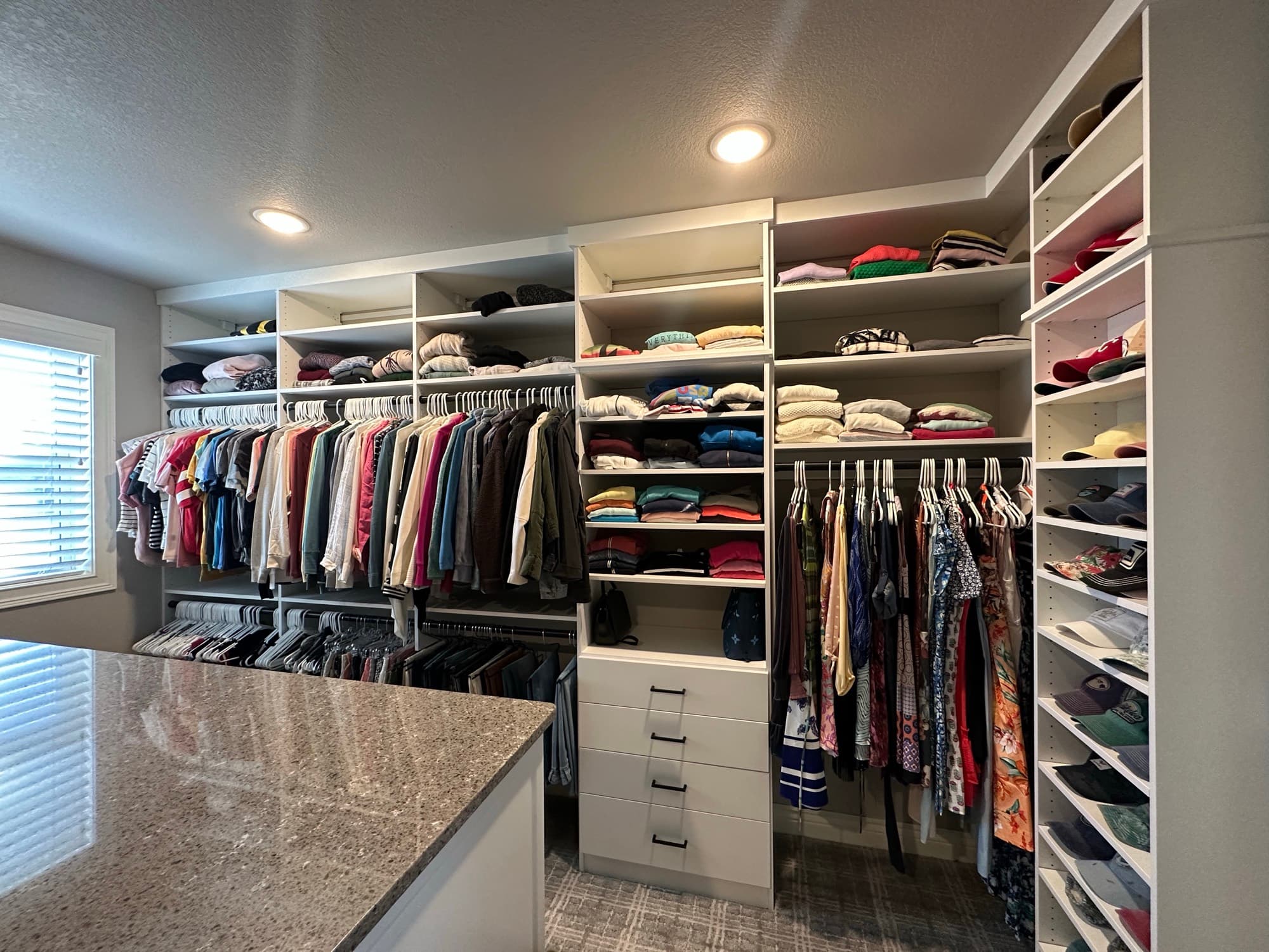 Walk-in closet with walnut island